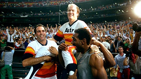 Teammates Jim Deshaies and Kevin Bass hoist Mike Scott into the air after he completes his division-clinching no-hitter, September 25, 1986